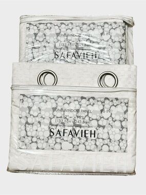 Two Safavieh Ivory Textured Silver Grommet Blackout Window Panels